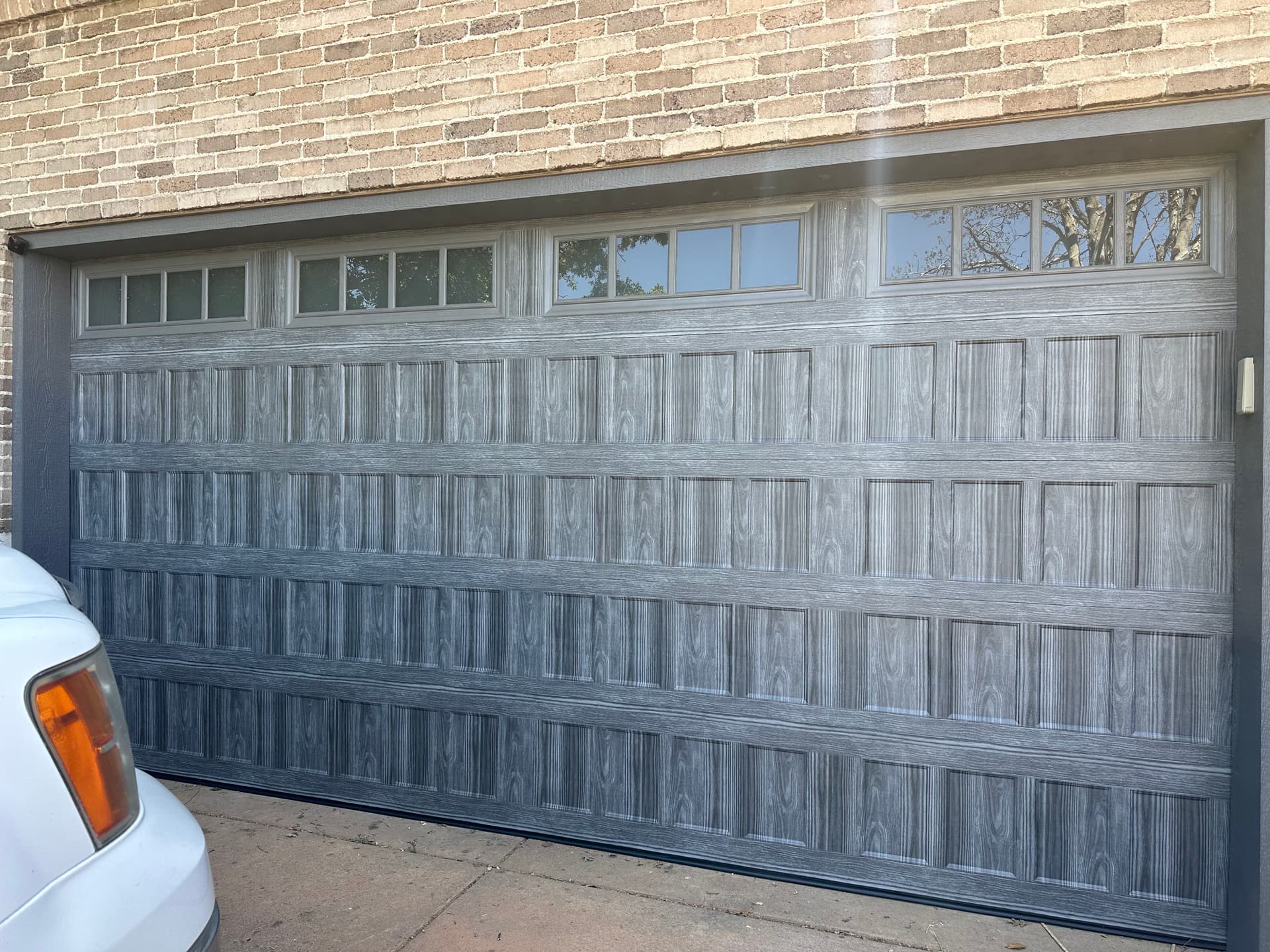 Gallery photos for Old Worn Garage Door Gets a Sharp New Upgrade: Image #1