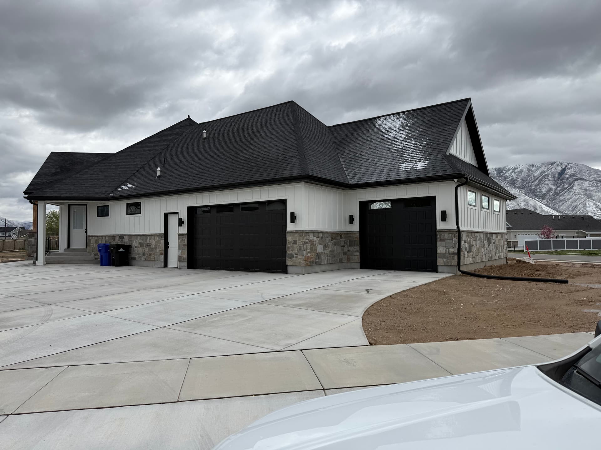 Gallery photos for Bold Black Garage Doors Built for a Mountain Home: Image #1