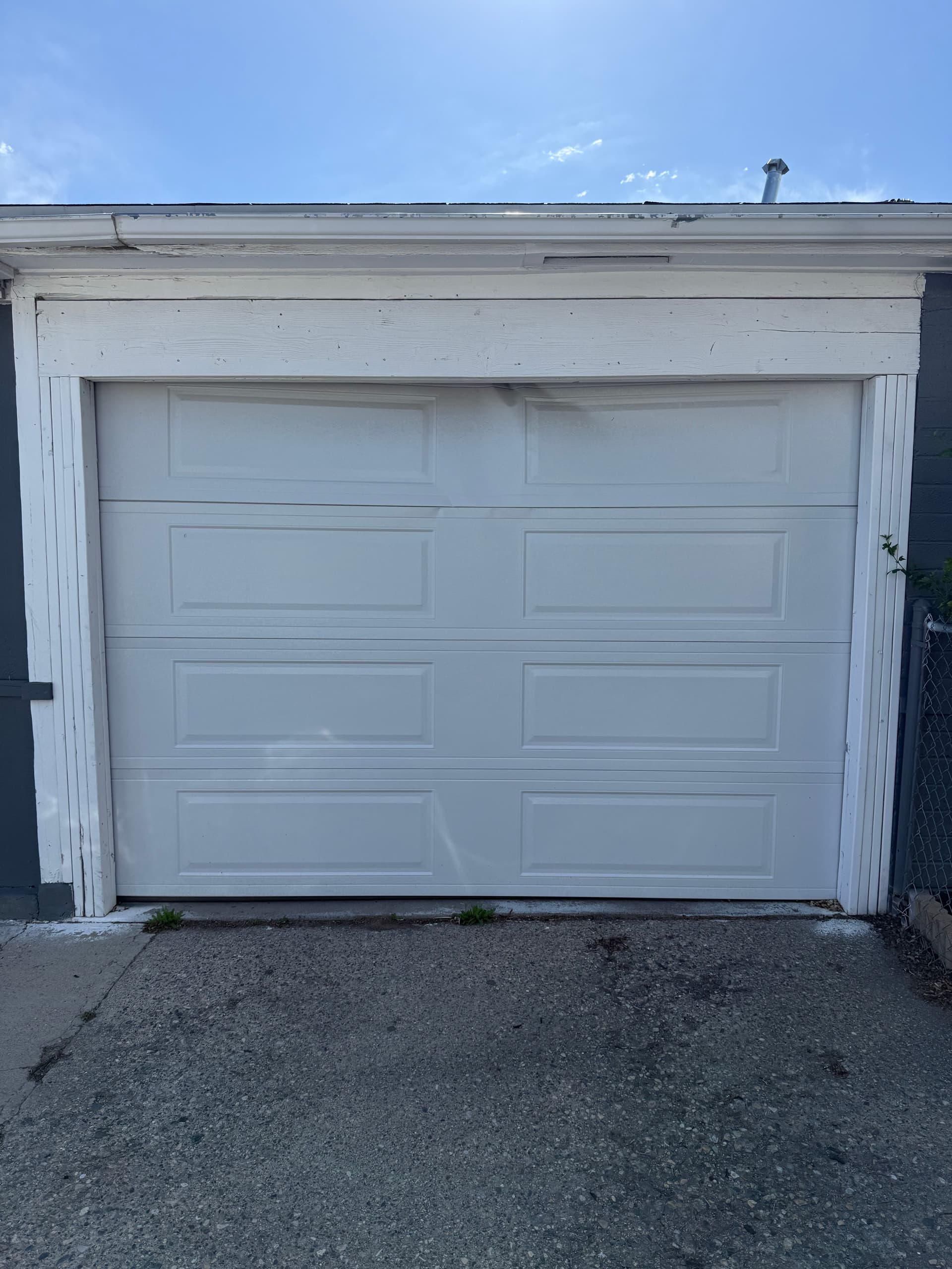 Damaged Garage Door Panels Repaired and Back in Action