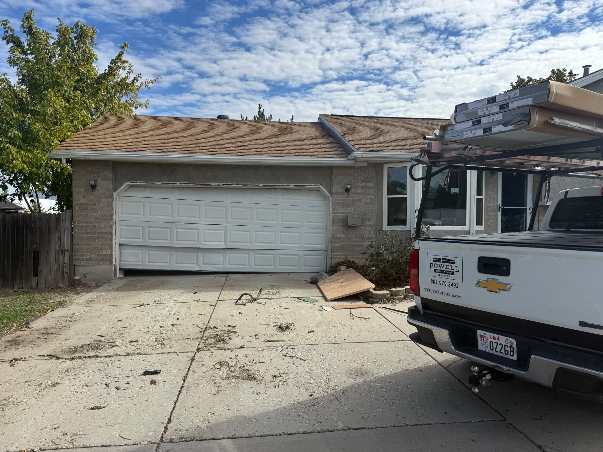 Long Panel Garage Door Replacement for a Property Remodel image